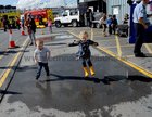<br />
Tom Fay and Ciara Mae Cullen, jumping in the water at  the Galway Lifeboat Open Day at the Docks. 