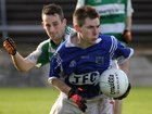 <br />
Kilconly's, Barry Concannon,<br />
and<br />
Oughterard's, Daniel Tuck,<br />
during the Intermediate Football Championship Final<br />
Replay at Pearse Stadium.<br />
