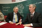 The Minister for Jobs, Enterprise and Innovation Richard Bruton, and David Toohey, President of Business Operations with Alere, during the new jobs announcement by Global healthcare company Alere at the Clayton Hotel last Friday.