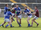 Laois v Galway Allianz Football League Division 2, round 3 game at Tuam Stadium,<br />
OUTNUMBERED ...  from left - Evan O'Carroll, Robbie Kehoe, Brendan Quigley and Paul Begley, Laois, and Galway's Fiontan O Curraoin and Damien Comer (right)