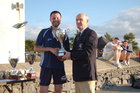 Pictured at the finals of Tag Rugby 2011 at Corinthian Park on Friday 22 July<br />
<br />
John Colleran, President of Galway Corinthians presemts the B Grade Cup to James Taylor of HP Saucier.