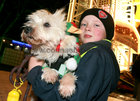 Dylan Casserly from Ballybane with his pet Lucky at the opening evening of the Continental Christmas Market