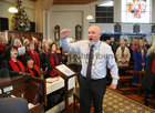 Mervue Folk Choir Director Ronnie Lawless conducts the choir during their Annual Christmas Mass in the The Holy Family Church, Mervue. Following the removal of Covid restrictions it was the choir’s first Christmas Mass performance since the start of the pandemic. It was also the last performance by the choir under the directorship of Ronnie who has stepped down after 44 years. 