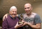 Tommy Hynes presenting the Noel Crowley Memorial trophy to PJ Coakley, B Team Player of the Year, at the West United AFC annual awards presentation night at Monroes.