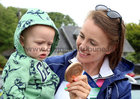 Aifric Keogh shows her Olympic medal to her nephew Jimmy Keogh at her homecoming celebrations on Monday.