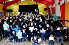 <br />
Para Olympic Gold Medal winner Eoghan Clifford, NUIGalway surrounded by Pupils and Teachers from St Patricks National School, Lombard Street during his visit to the school. 