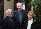 Fr. Frank Lakin, C.C., and John and Jo Mannion at the Bushypark Senior Citizens Christmas dinner party at the Westwood House Hotel.