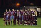 Mervue United players and mascots observe a minutes silence in memory of the late Pascal O'Brien before the Air Tricity League First Division game against Shelbourne FC at Fahy's Field last Friday evening.