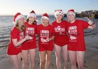 Fiona Bateman, Menlo, with her daughters, from left, Eva, Zoe, Sadbh and Melissa at Blackrock for their Christmas Day swim in aid of Cope Galway.