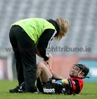 Declan Cormican, Cappataggle grimaces in pain after sustaining an injury late in the game.