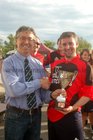 At the finals night of Tag Rugby at Galway Corinthians at Corinthian Park, Cloonacauneen.<br />
<br />
XXXX, Captain of Duffs, receives the C League 3 tropy from Galway Corinthians president Declan Russell