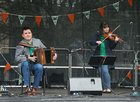 Brendan Browne and Maureen Browne of Galway Irish traditional group BackWest performing at Eyre Square before the start of the St Patrick's Day Parade.