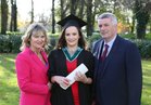 Aoife Carr from Oranmore pictured with her parents Mary Boyce and Tom Carr after she was conferred with the degree of B Sc, Honours, at NUI Galway.