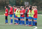 Knocknacarra FC players observe a minute’s silence in memory of Ashling Murphy before the start of the Under 12 National Cup game against Salthill Devon FC at Cappagh Park last Sunday.