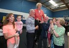 Cllr Terry O'Flaherty celebrates with Fainsin Loughlin (niece) and her son Ruadhán, Aonghus Ó Concannon (brother-in-law), her brother Tony O'Flaherty, and sisters Betty and Claire, after she was elected during the Galway City East count at the Westside centre.