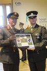 Brig Patrick Flynn, GOC ! Brigade, presents Ptv James Buckley, with his award for the best shot  at the 146th Recruit  Platoon Passing Out Parade at Dun U√≠ Mhaoil√≠osa Renmore. 