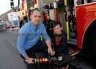 <br />
Fireman David Badger with Jamie Lambe-Westside, at the Galway Lifeboat Open Day at the Docks. 