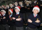 Pupils from St. Patricks,School Lombard Street Andrew Byrne, Joshua Keega, Evan Forde and Alan Chen, Singing Christmas Carols fundraising for Galway over Christmas 