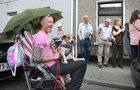 Ray Power and pet Charlie during the entertainment at St Brigits Terrace, Prospect Hill, during Covid-19<br />
