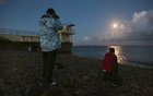 Many people were out at Blackrock on Sunday night to gaze at and photograph the supermoon, the full moon that reaches the point in it's orbit when it is at it's brightest and closest to Earth.<br />
