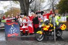 Santa  Claus with Tiernan O‚ÄôMalley, David O Greely, Aisling O‚ÄôDriiscoll, Avril Smith, Micky Mouse Mrs Claus, Sarah McGinn, Gill Carroll, Cormac McGuckian, and Frrgal Gallagher, Blood Bike  at the launch  of Lighing up Galway City  at the Eyre Square Shopping Centre. 