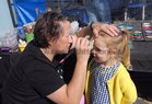 <br />
Sarah Glynn, has her face painted by Liz Jacob, at the Galway Lifeboat Open Day at the Docks. 