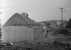 Tullycross thatched cottages under construction 15 March 1973