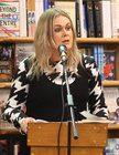 Poet Elaine Feeney speaking at the launch of Rita Ann Higgins’ book of essays and poems, ‘Our Killer City: isms, chisms, chasms and schisms’, in Charlie Byrne’s Bookshop. Elaine officially launched the book.
