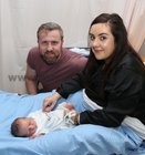 Cliodhna Ní Ghriofa from An Cheathru Rua, and Éinne Ó hEochaidh, An Spidéal, with their son Tadhg who was born at 11.27am on New Years Day at UHG.