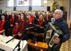 Sean O’Healy performs during the Mervue Folk Choir Annual Christmas Mass in the The Holy Family Church, Mervue. Following the removal of Covid restrictions it was the choir’s first Christmas Mass performance since the start of the pandemic. It was also the last Mass performance by the choir under the directorship of Ronnie Lawless who has stepped down after 44 years. 