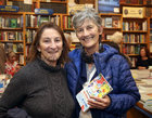 Poet Mary O'Malley and Catherine Connolly TD at the launch of Rita Ann Higgins’ book of essays and poems, ‘Our Killer City: isms, chisms, chasms and schisms’, in Charlie Byrne’s Bookshop.