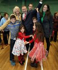 Galway West Fianna Fail candidate Eamon Ó Cuiv celebrates after his election with his wife Aine, their children Eamon Óg and Eimear, and grandchildren Aine, Mairead Eamon and Sean.