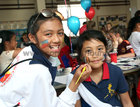 Angela and Nicole face painting during International Day at the Mercy Primary School in Francis Street.