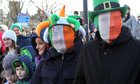 Spectators watch the St Patrick's Day parade outside Galway Cathedral.