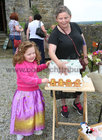 Bríd Harris from Ardrahan, the 'Gingerbread Woman', with Ruby Rose Flaherty of Oranmore at Oranmore Castle Heritage Fair last weekend.
