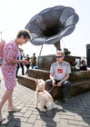 HIS MASTERS VOICE . . . Margaret Donoghue of Dyke Road and Mike Gannon, Raleigh Row, with Alfie at sculptor Donnacha Cahill's Gramophone during the Westend Street Feast.