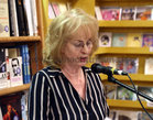 Rita Ann Higgins speaking at the launch of her book of essays and poems, ‘Our Killer City: isms, chisms, chasms and schisms’, in Charlie Byrne’s Bookshop.
