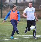 Sandro Perna and Peter Gill in action during the annual COPE Galway charity match.<br />
