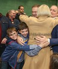 Galway West Fianna Fail candidate Eamon Ó Cuiv celebrates with his wife Aine and their grandsons sean and Eamon as he is elected.