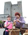 Robyn O'Brien from Maree getting a demonstration of the craft of willow making from Mo the Willow Witch from Tuam at Oranmore Castle Heritage Fair last weekend.