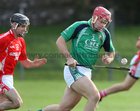 Liam Mellows v Carnmore Cooper Senior Hurling Championship game at Athenry.<br />
John Lee, Liam Mellows, and Cathal Hynes, Carnmore