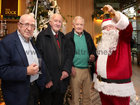 Danny Barrett, Paddy Glynn and Pearce Wade with Santa (Fred Diviney) at the Mervue and Renmore Community Christmas lunch in the Connacht Hotel.