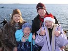 Pauline and Kevin McDonagh from Roscam with their daughters Laoise, left, and Aoife Rose after their Christmas Day swim at Blackrock.