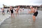 Ronnie Greaney of the Dew Drop Inn with his sister Sheila and his daughter Katie at Blackrock for their Christmas Day Swim.