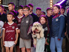 Galway Manager Pádraic Joyce's daughter Jodie holding her pet dog during the homecoming ceremony at Pearse Stadium on Monday evening.