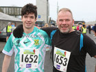 Evan Spelman and his uncle Tom Spelman, Clarenbridge before the start of the 2023 Fields of Athenry 10k Road Race on St Stephen's Day.