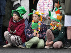 Young spectators awaiting the start of the St Patrick's Day parade at University Road