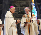 The retired Bishop of Galway, Most Rev Martin Drennan, hands over the crozier to Bishop Brendan Kelly, the new Bishop of Galway, Kilmacduagh and Apostolic Administrator of Kilfenora, during his Installation at Galway Cathedral on Sunday. 