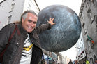Galway International Arts Festival Artistic Director Paul Fahy at UK artist Luke Jerram's Museum of the Moon in Shop Street for the start of Galway International Arts Festival. Measuring seven metres in diameter, the moon features 120dpi detailed NASA imagery of the lunar surface. It is now on view indoors at the Human Biology Building at NUI Galway until Sunday July 29. 