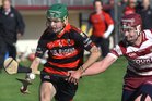  Cappataggle's, Gary Lohan,<br />
 and<br />
 Rahoon-Salthill's, Kenneth King,<br />
 during the County Minor(B) Hurling Championship Final at Athenry.<br />
